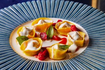 Tortelli “norma” with eggplant, aged ricotta sauce, confit date tomatoes and basil